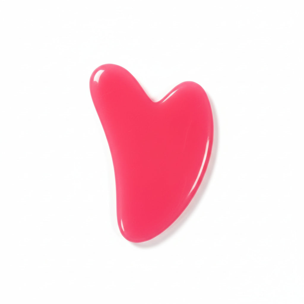 hot pink heart-shaped object on a white surface
